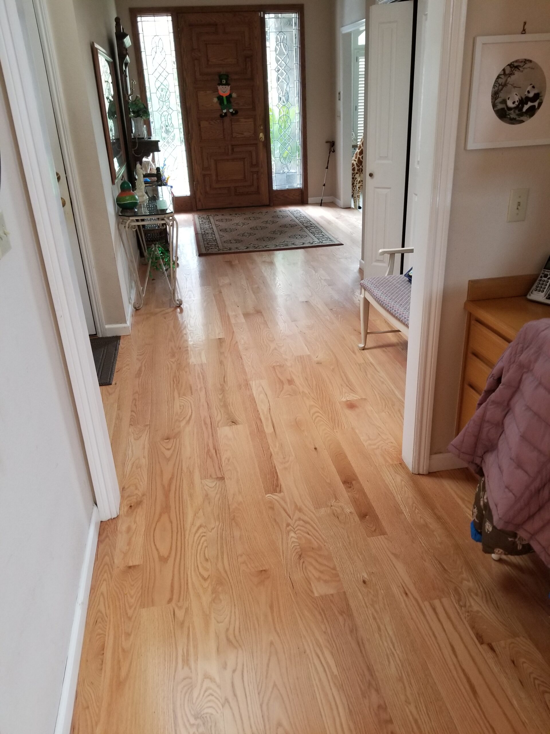 Los Altos home: 1500 square foot: Red Oak entry way installation and stain and refinish with 3 coats of H2O base semi-gloss finish.