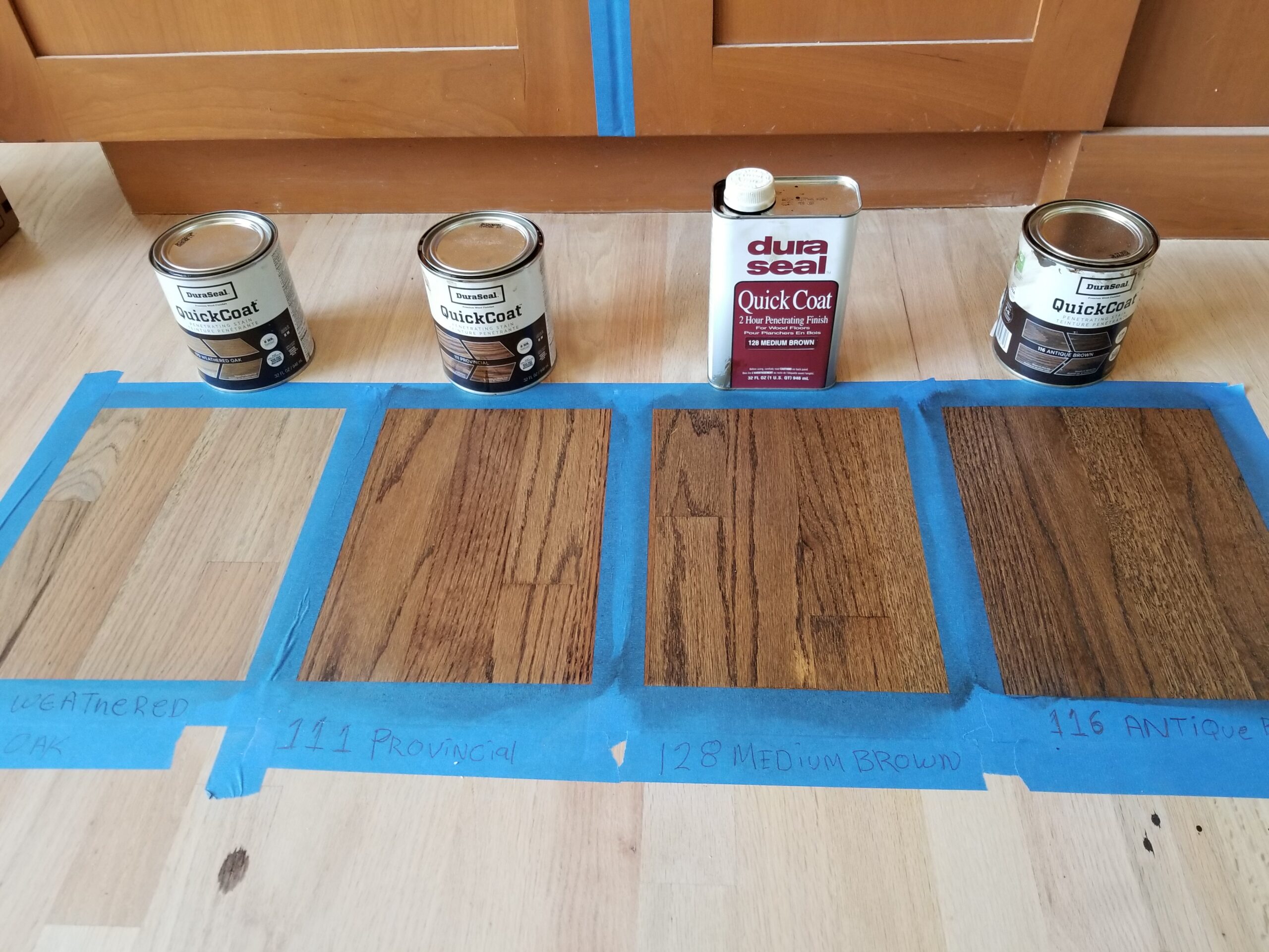 Floor stains: color mock-up Red Oak hardwood to determine best color contrast with background kitchen cabinets.