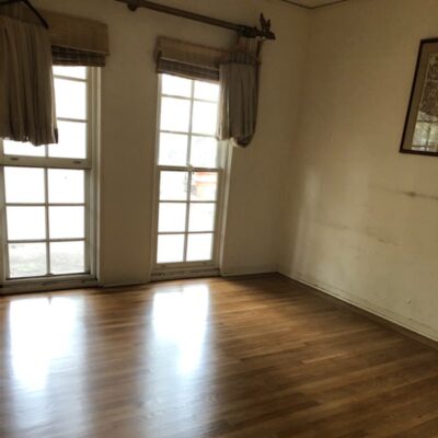 Master bedroom’s 100 year-old floors look like new again.