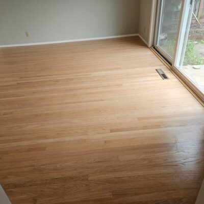 Sunnyvale Residential Bedroom: Prefinished red oak hardwood flooring with sliding door: sanded, stripped, and added three coats of semi-gloss water-base finish. 