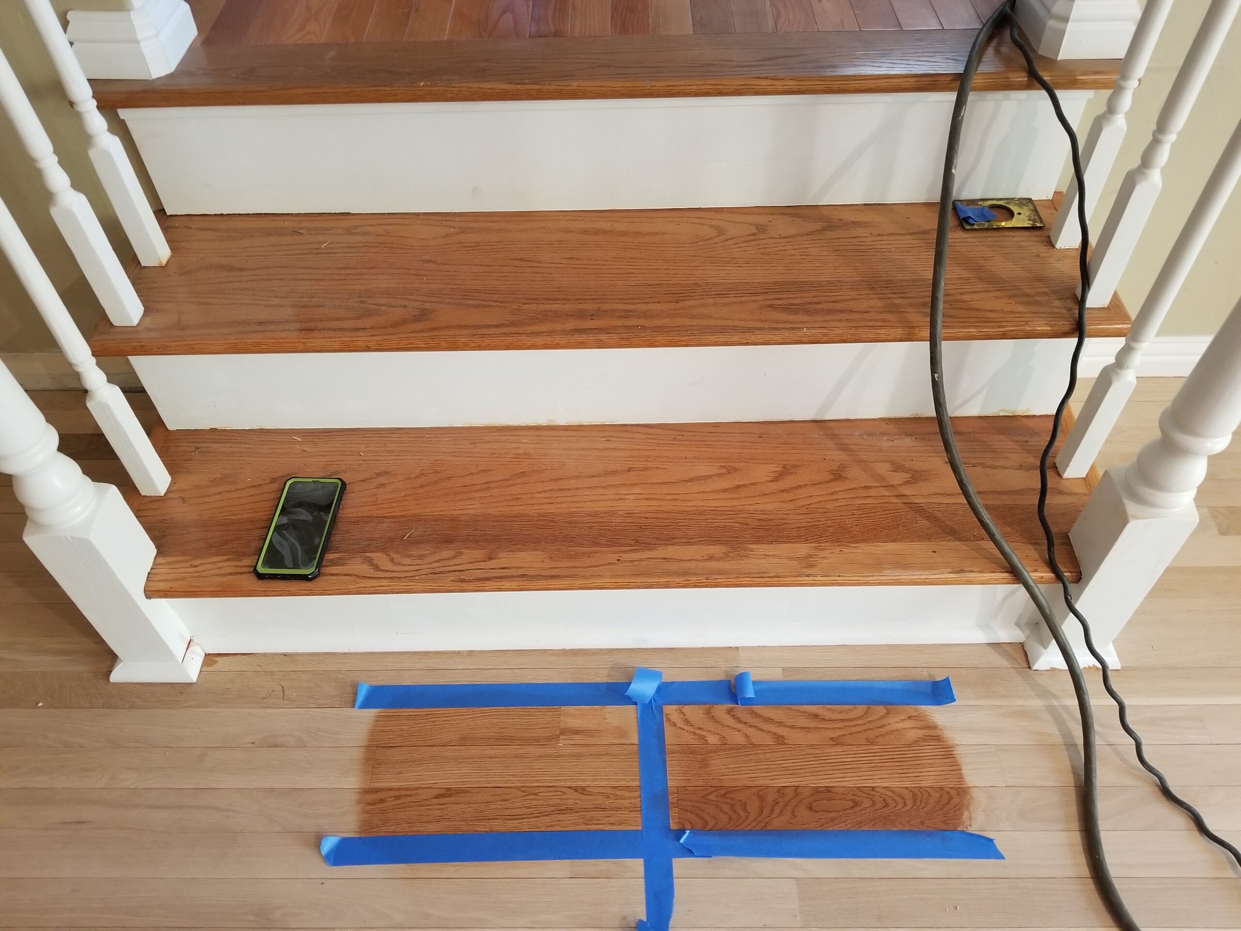 Stain-and-finish mockup for Palo Alto residential stairs.
