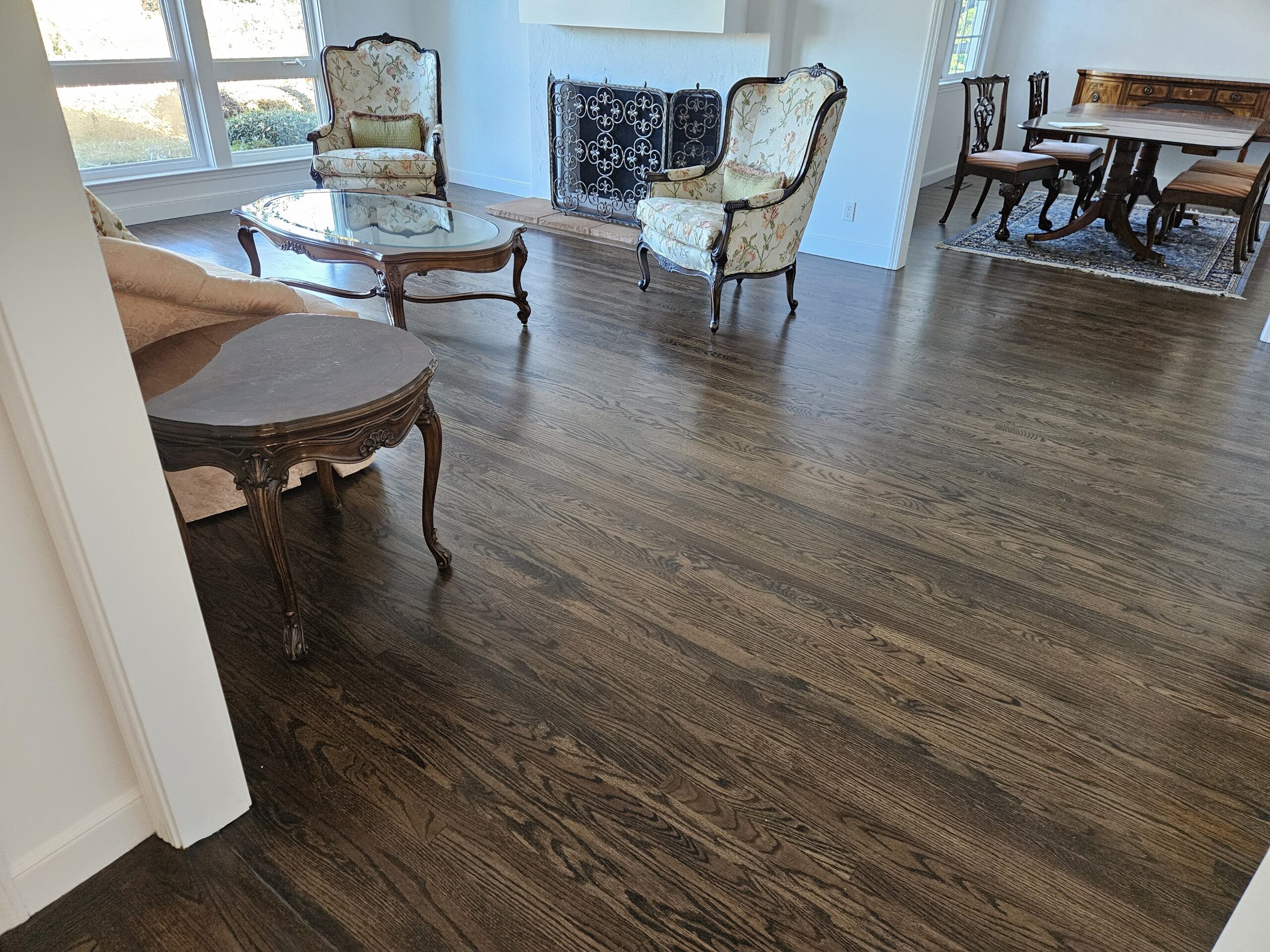Refinish 1,800 square feet Red Oak flooring living room.